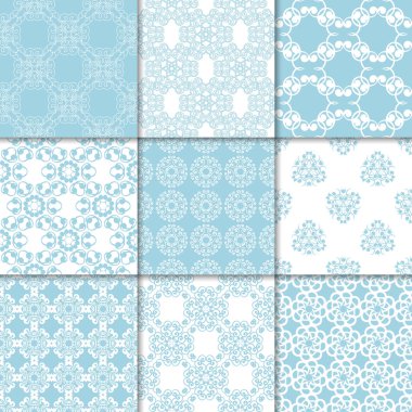 Mavi ve beyaz çiçekli süsler. Kağıt için dikişsiz desen koleksiyonu Tekstil