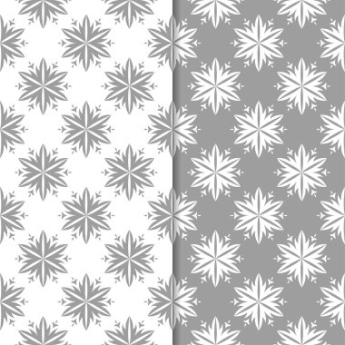 Beyaz ve gri çiçek arka planlar. Tekstil ve duvar kağıtları için dikişsiz desen seti