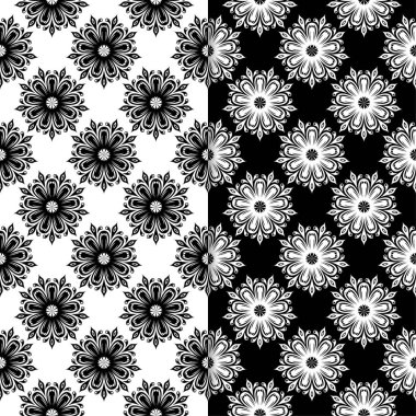 Siyah ve beyaz çiçekli süsler. Tekstil ve duvar kağıtları için sorunsuz arka planlar kümesi