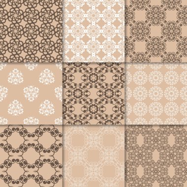 Kahverengi Bej çiçekli süsler. Kağıt için dikişsiz desen koleksiyonu Tekstil