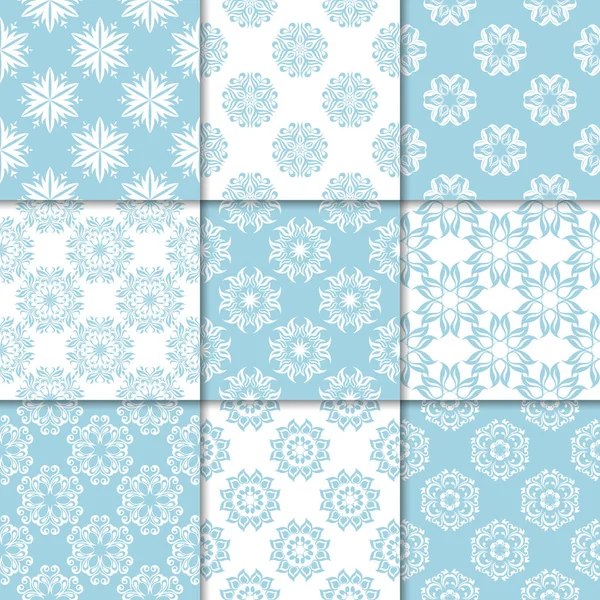 Mavi ve beyaz çiçekli süsler. Kağıt için dikişsiz desen koleksiyonu Tekstil