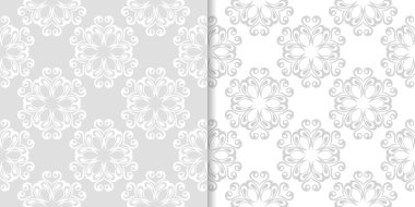 Işık gri ve beyaz çiçekli süsler. Tekstil ve duvar kağıtları için dikişsiz desen seti