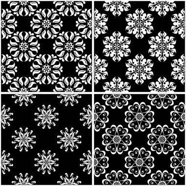 Çiçek desenleri. Siyah beyaz tek renkli kesintisiz arka planlar kümesi. Vektör çizim