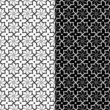 Siyah ve beyaz çiçekli süsler. Tekstil ve duvar kağıtları için sorunsuz arka planlar kümesi