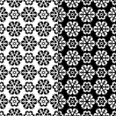 Siyah ve beyaz çiçek arka planlar. Tekstil ve duvar kağıtları için dikişsiz desen seti