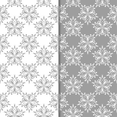 Beyaz ve gri arka plan çiçek kümesi. Tekstil ve duvar kağıtları için dikişsiz desen