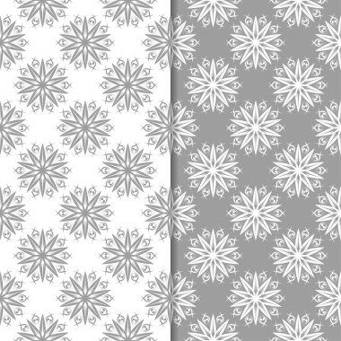 Beyaz ve gri çiçek arka planlar. Tekstil ve duvar kağıtları için dikişsiz desen seti