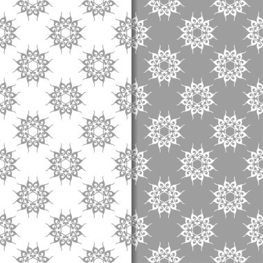 Beyaz ve gri çiçek arka planlar. Tekstil ve duvar kağıtları için dikişsiz desen seti