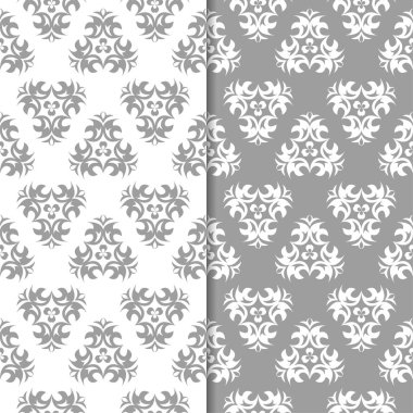 Beyaz ve gri arka plan çiçek kümesi. Tekstil ve duvar kağıtları için dikişsiz desen