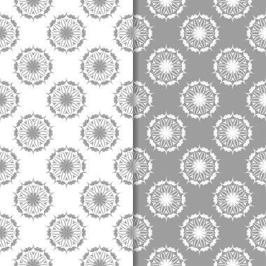 Beyaz ve gri çiçek süs tasarımlar. Tekstil ve duvar kağıtları için dikişsiz desen seti