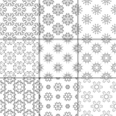 Gri ve beyaz çiçekli süsler. Kağıt için tarafsız Dikişsiz desen koleksiyonu Tekstil