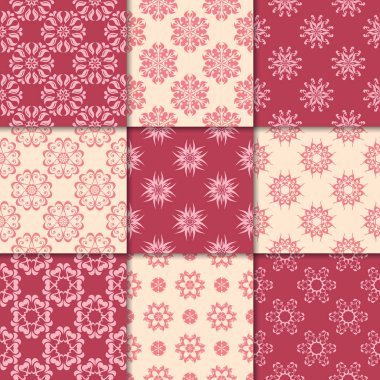 Kiraz kırmızı ve bej çiçekli süsler. Kağıt için dikişsiz desen koleksiyonu Tekstil