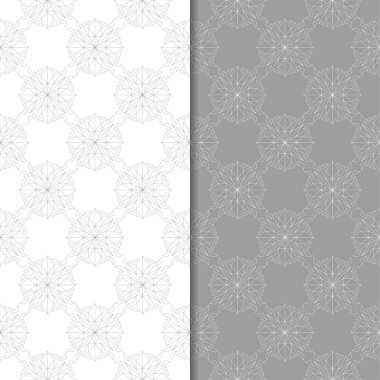 Beyaz ve gri çiçek süsler. Tekstil ve duvar kağıtları için sorunsuz arka planlar kümesi