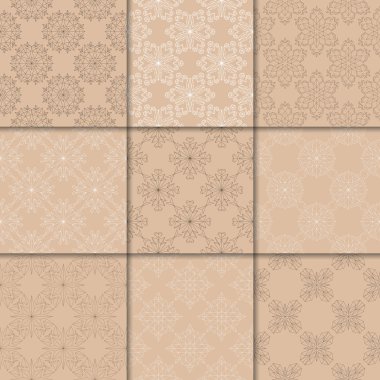 Kahverengi Bej çiçekli süsler. Kağıt için dikişsiz desen koleksiyonu Tekstil