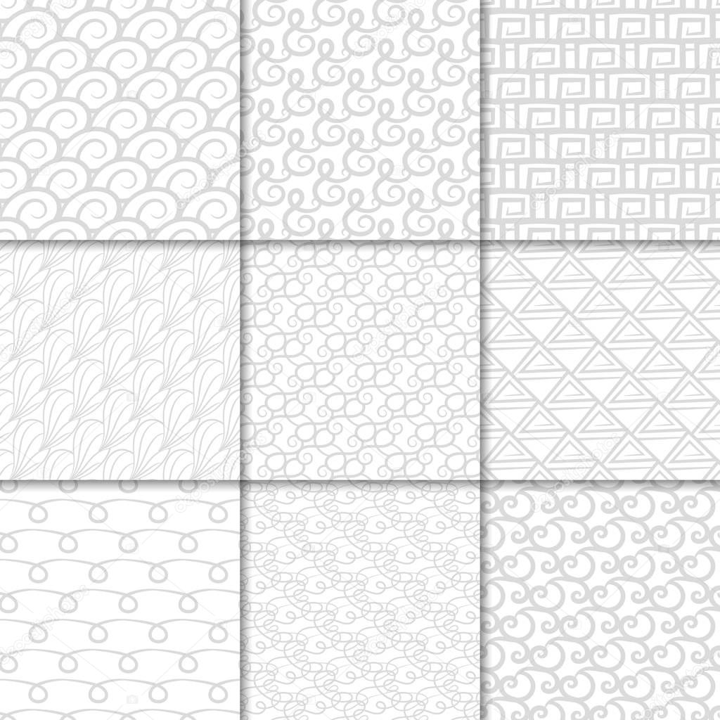 Abstract seamless patterns. White and gray backgrounds for textile, wallpapers and fabrics