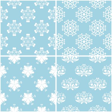 Çiçek desenleri. Mavi ve beyaz sorunsuz arka planlar kümesi. Vektör çizim