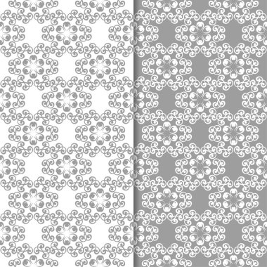 Beyaz ve gri çiçek arka planlar. Tekstil ve duvar kağıtları için dikişsiz desen seti