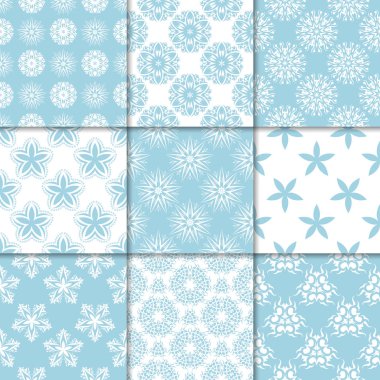 Mavi ve beyaz çiçekli süsler. Kağıt için dikişsiz desen koleksiyonu Tekstil