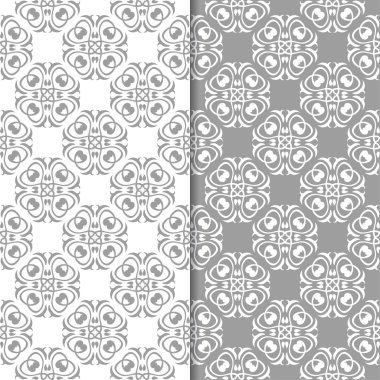 Beyaz ve gri çiçek arka planlar. Tekstil ve duvar kağıtları için dikişsiz desen seti