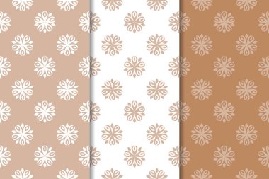 Kahverengi çiçek arka planlar. Tekstil ve duvar kağıtları için dikişsiz desen seti