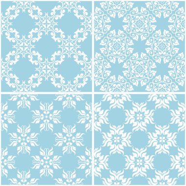 Çiçek desenleri. Mavi ve beyaz sorunsuz arka planlar kümesi. Vektör çizim