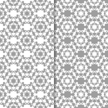 Beyaz ve gri çiçek arka planlar. Tekstil ve duvar kağıtları için dikişsiz desen seti