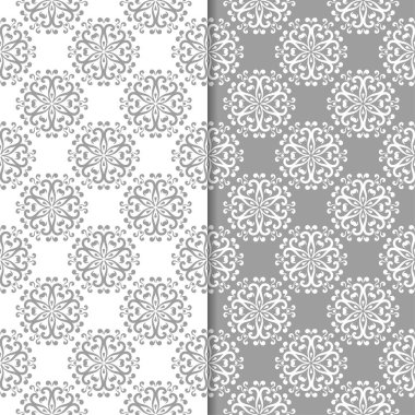 Beyaz ve gri çiçek arka planlar. Tekstil ve duvar kağıtları için dikişsiz desen seti