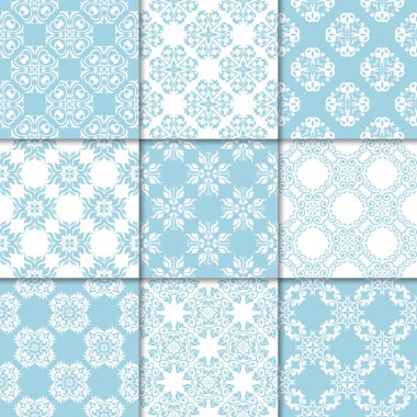 Mavi ve beyaz çiçekli süsler. Kağıt için dikişsiz desen koleksiyonu Tekstil