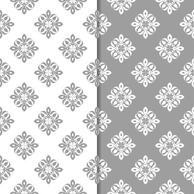 Beyaz ve gri çiçek arka planlar. Tekstil ve duvar kağıtları için dikişsiz desen seti