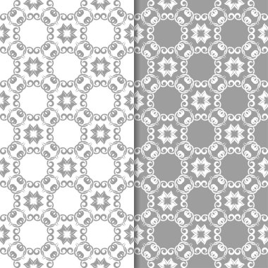 Beyaz ve gri arka plan çiçek kümesi. Tekstil ve duvar kağıtları için dikişsiz desen