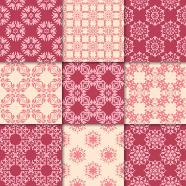 Kiraz kırmızı ve bej çiçekli süsler. Kağıt için dikişsiz desen koleksiyonu Tekstil