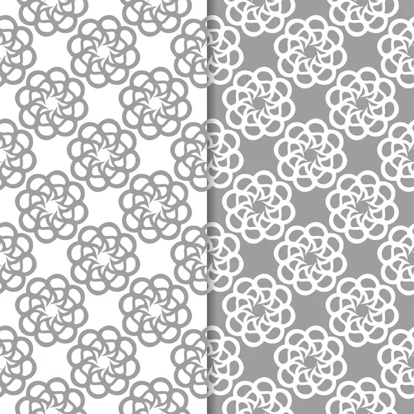 Beyaz ve gri çiçek arka planlar. Tekstil ve duvar kağıtları için dikişsiz desen seti