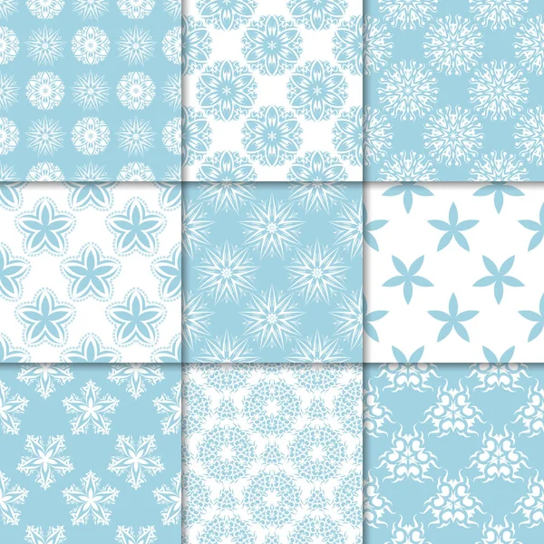 Mavi ve beyaz çiçekli süsler. Kağıt için dikişsiz desen koleksiyonu Tekstil