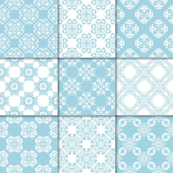 Mavi ve beyaz çiçekli süsler. Kağıt için dikişsiz desen koleksiyonu Tekstil