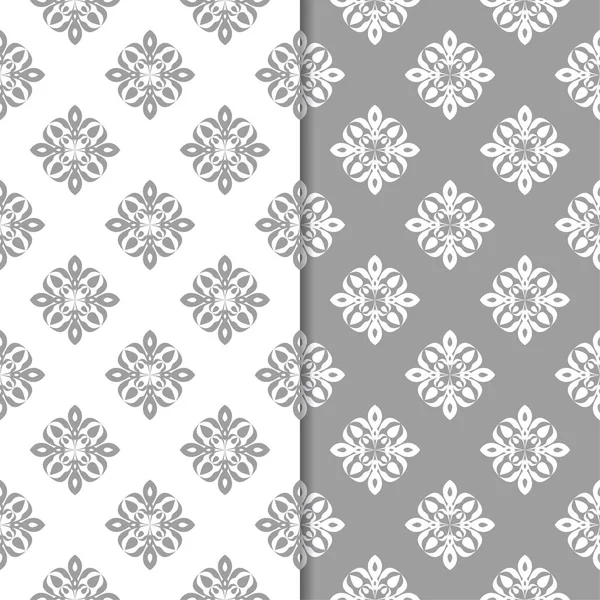 Beyaz ve gri çiçek arka planlar. Tekstil ve duvar kağıtları için dikişsiz desen seti