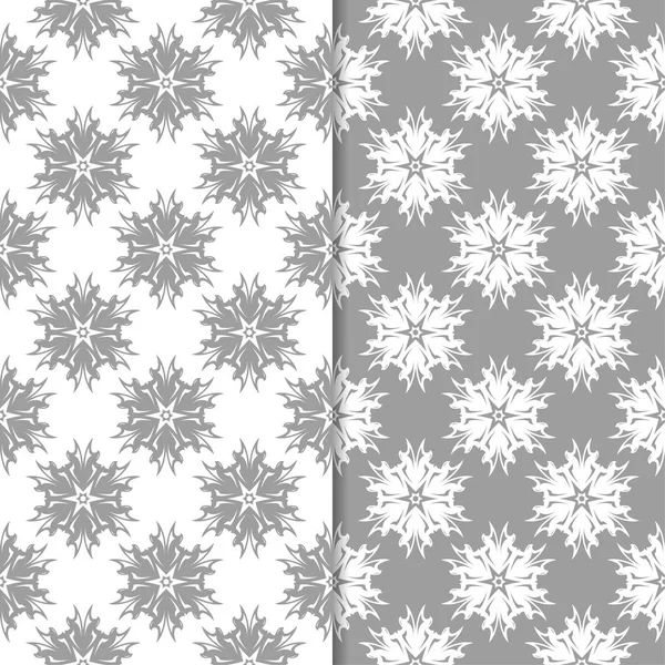 Beyaz ve gri çiçek süsler. Tekstil ve duvar kağıtları için sorunsuz arka planlar kümesi