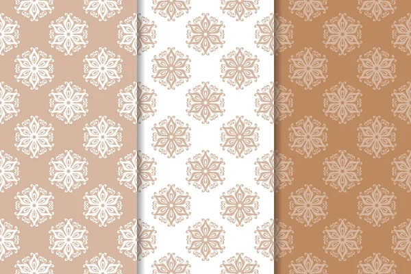 Kahverengi ve bej çiçek arka planlar kümesi. Tekstil ve duvar kağıtları için dikişsiz desen seti