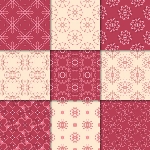 Kiraz kırmızı ve bej çiçekli süsler. Kağıt için dikişsiz desen koleksiyonu Tekstil