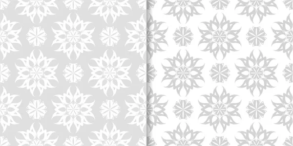 Işık gri ve beyaz çiçekli süsler. Tekstil ve duvar kağıtları için dikişsiz desen seti