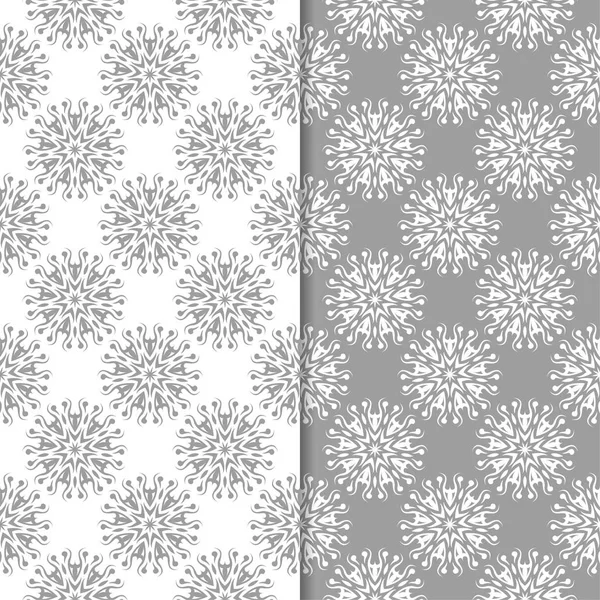 Beyaz ve gri çiçek arka planlar. Tekstil ve duvar kağıtları için dikişsiz desen seti