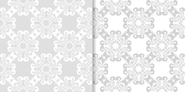 Işık gri ve beyaz çiçekli süsler. Tekstil ve duvar kağıtları için dikişsiz desen seti