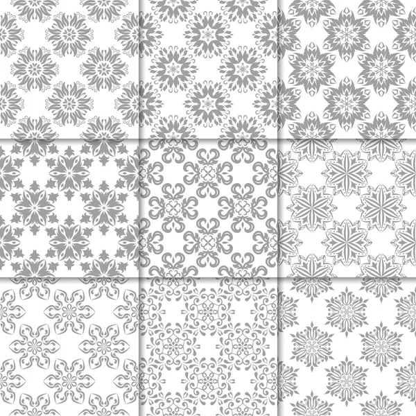 Gri ve beyaz çiçekli süsler. Kağıt için tarafsız Dikişsiz desen koleksiyonu Tekstil
