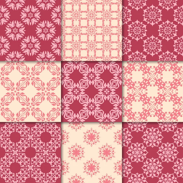 Kiraz kırmızı ve bej çiçekli süsler. Kağıt için dikişsiz desen koleksiyonu Tekstil