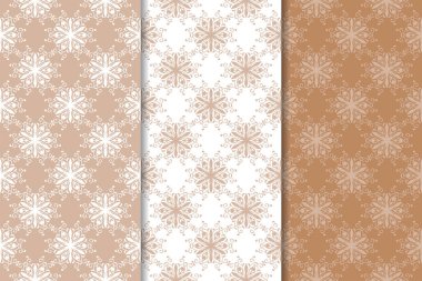 Kahverengi ve bej çiçek arka planlar kümesi. Tekstil ve duvar kağıtları için dikişsiz desen seti