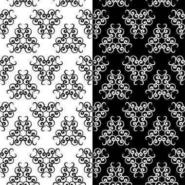 Siyah ve beyaz çiçekli süsler. Tekstil ve duvar kağıtları için sorunsuz arka planlar kümesi