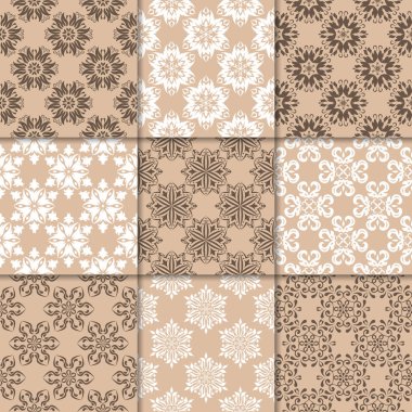 Kahverengi Bej çiçekli süsler. Kağıt için dikişsiz desen koleksiyonu Tekstil