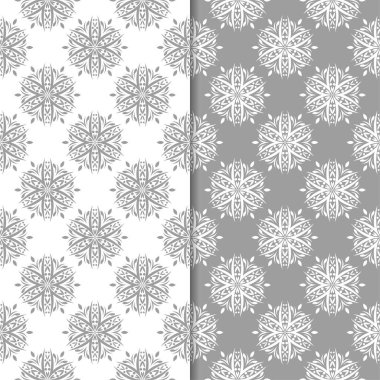 Beyaz ve gri çiçek arka planlar. Tekstil ve duvar kağıtları için dikişsiz desen seti