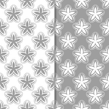 Beyaz ve gri çiçek arka planlar. Tekstil ve duvar kağıtları için dikişsiz desen seti
