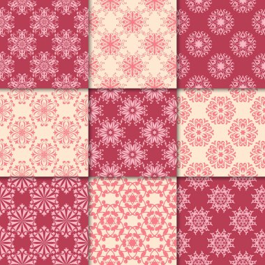 Kiraz kırmızı ve bej çiçekli süsler. Kağıt için dikişsiz desen koleksiyonu Tekstil