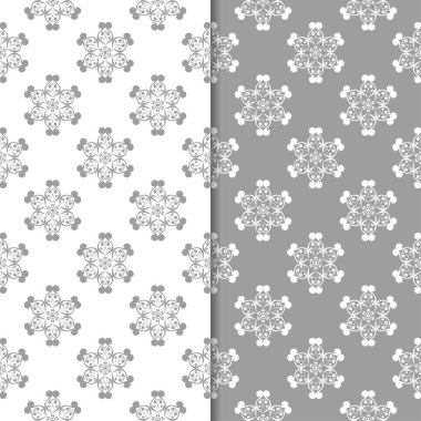 Beyaz ve gri çiçek arka planlar. Tekstil ve duvar kağıtları için dikişsiz desen seti